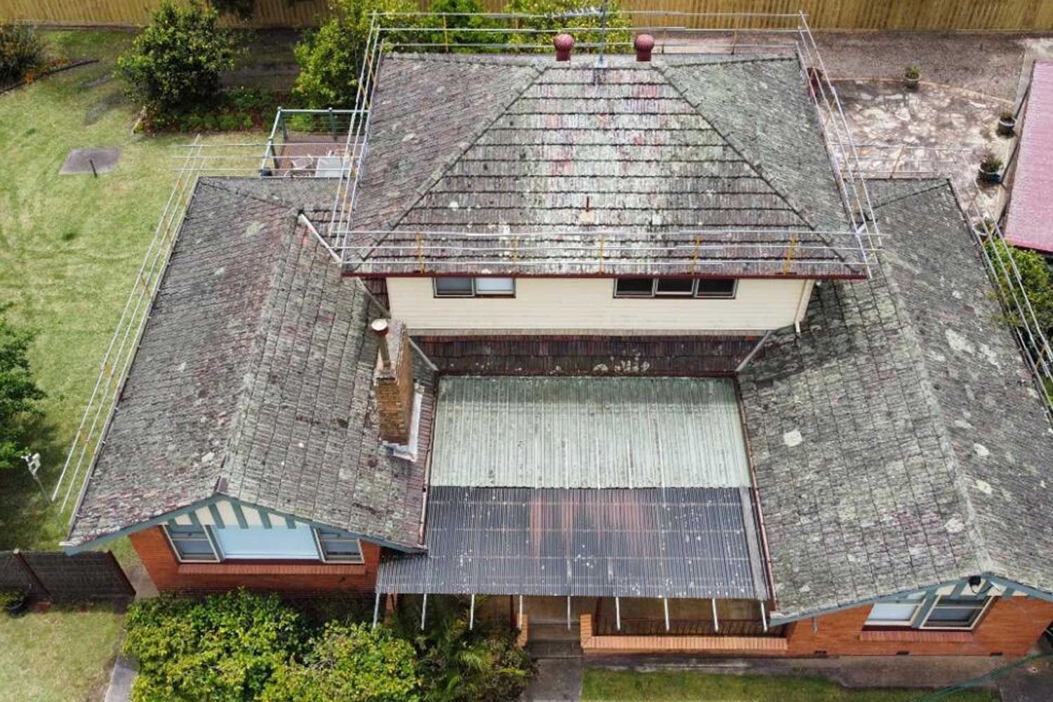 Before photo of tiled roof restoration on the Surf Coast