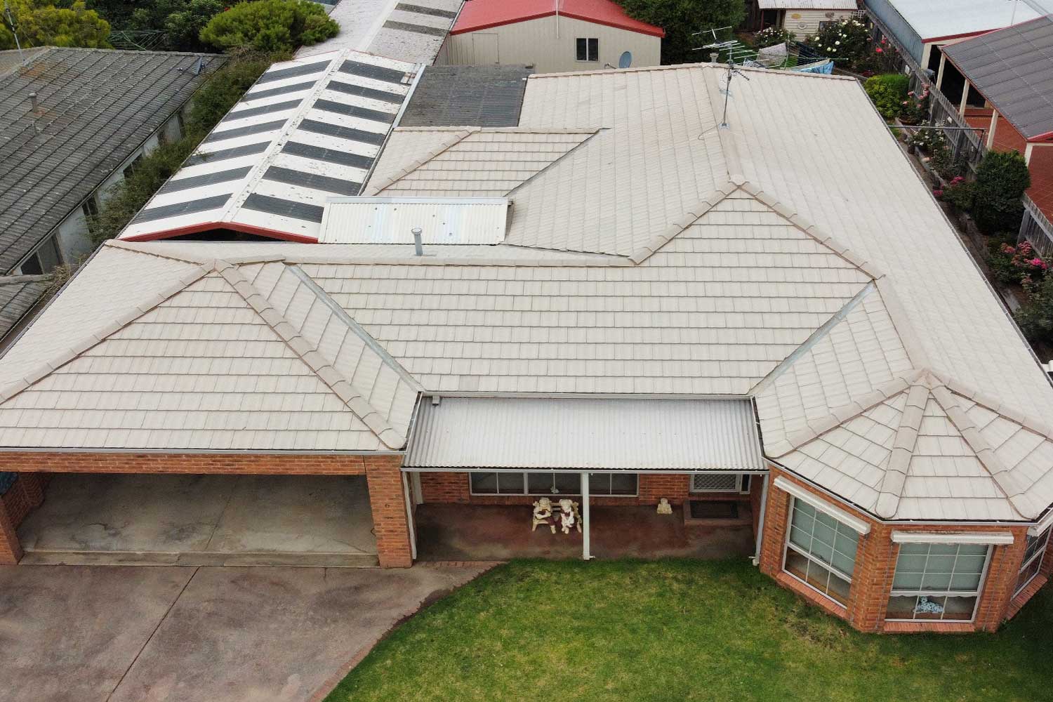 Before photo of tiled roof restoration in Clifton Springs